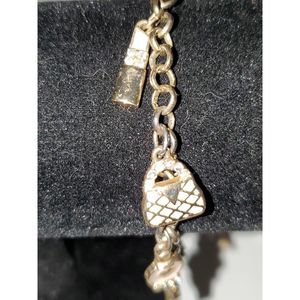 A Guess Women's Charm Bracelet Gold Tone Chain Lipstick Rhinestone